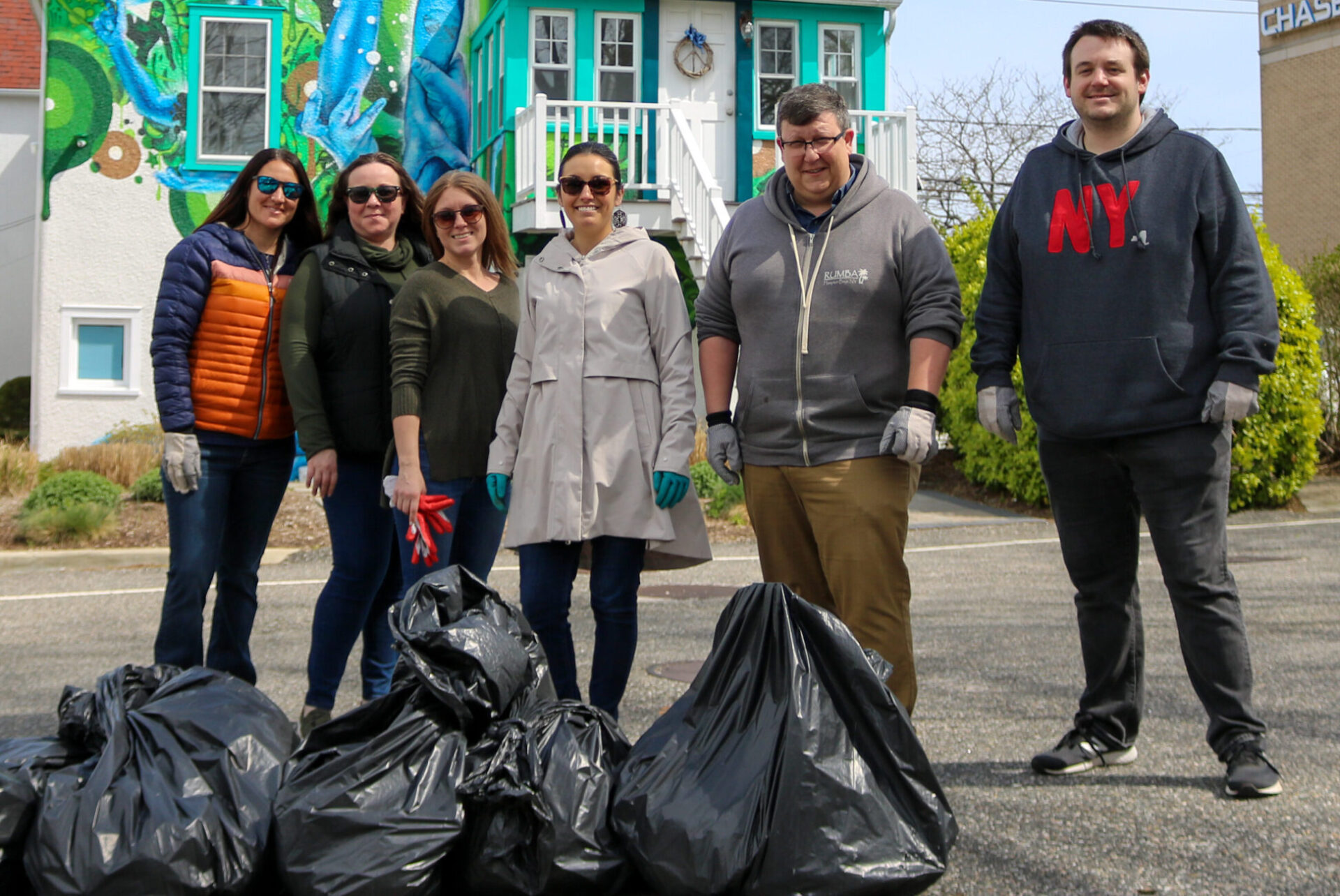 Rooted Hospitality Group's Office Team Tackles a Parking Lot Cleanup