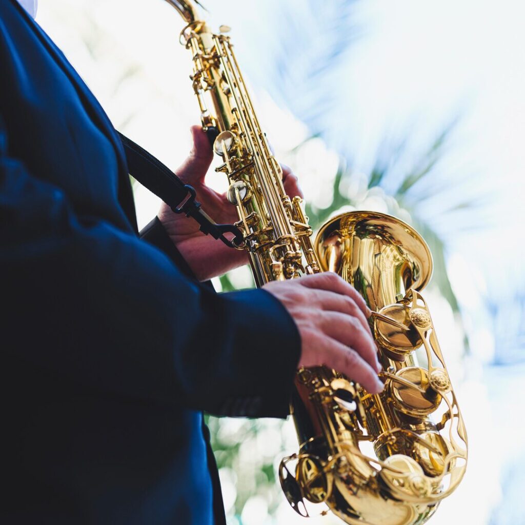Saxophone player outside on Fauna's patio