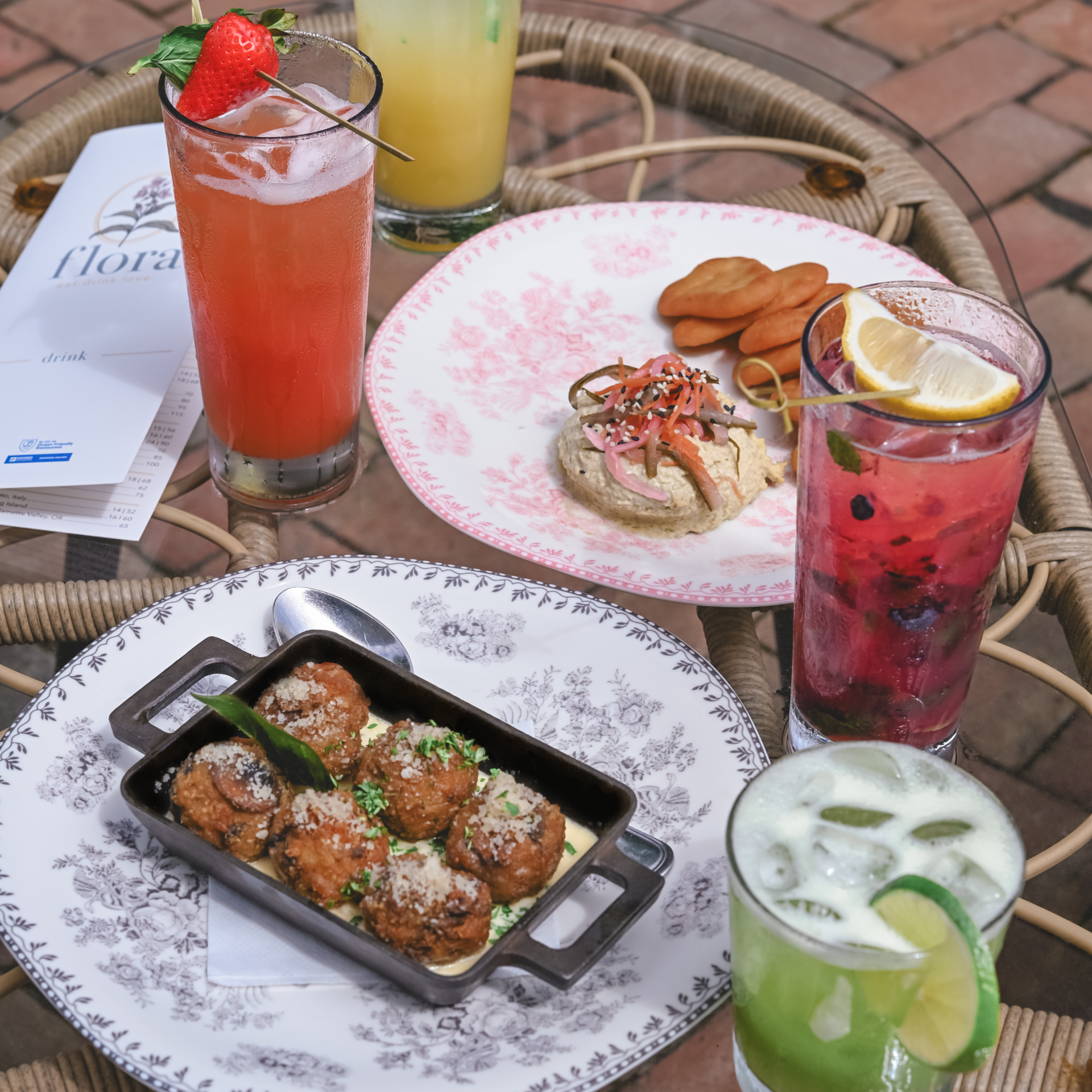 flora Charlotte Social Hour featuring shareable plates and zero proof cocktails.